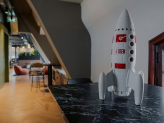 a model of a rocket sitting on top of a table