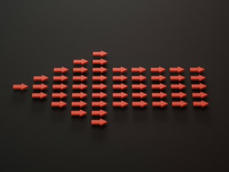 a group of red arrows on a black surface